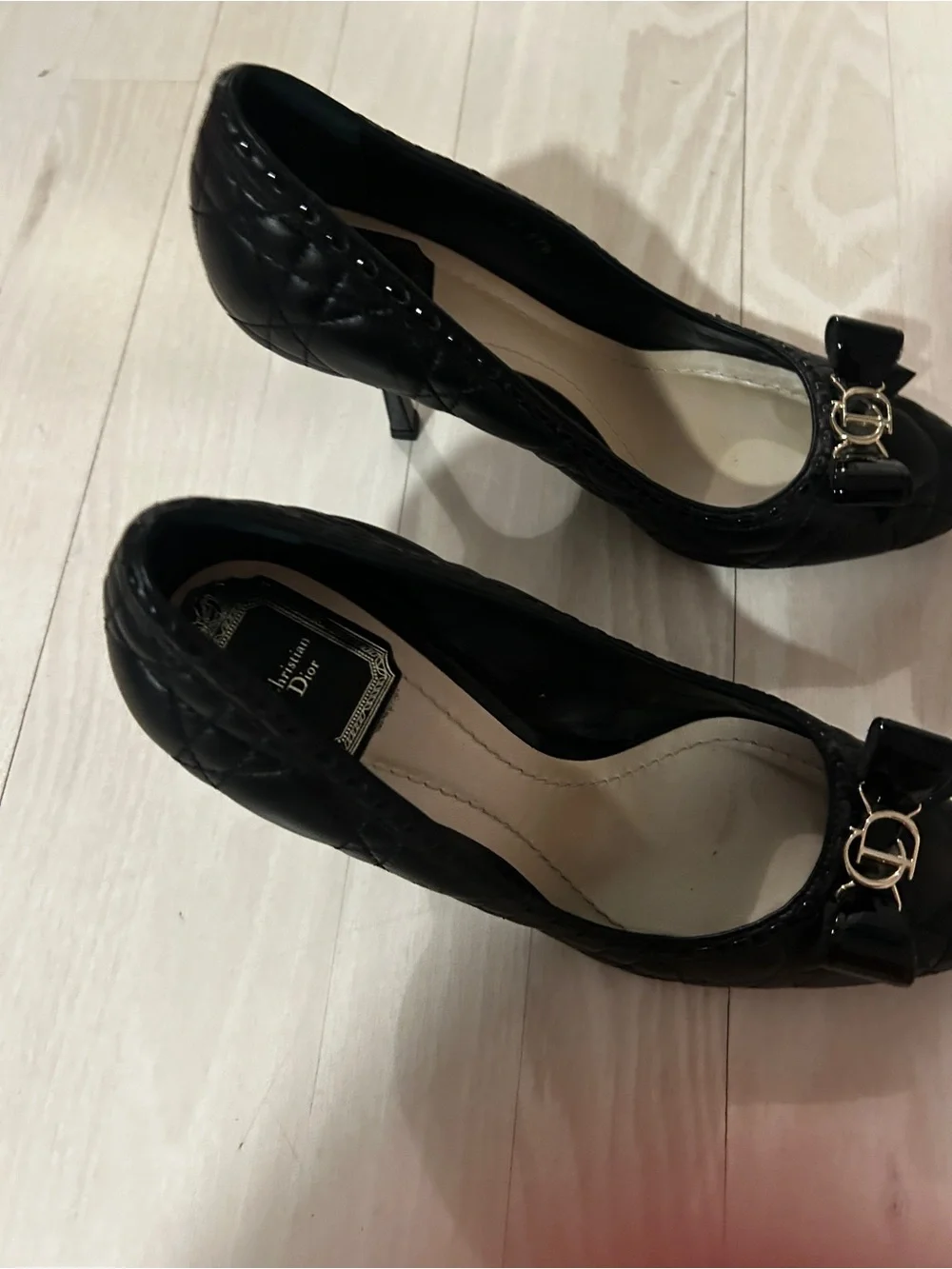 Dior Black Quilted Cannage leather heels.  Gold CD Bow